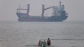 A vessel in the Strait of Hormuz near the beach of Bandar Abbas, Iran, June 30, 2026. (REUTERS)