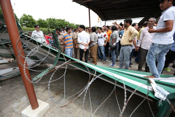 Buyers protest against Jaypee in Noida sector 128 office on saturday. Express Photo by Gajendra Yadav
