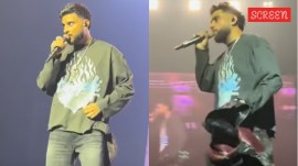 Karan Aujla lashes out at a fan for throwing jacket at him on stage