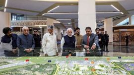 Prime Minister Narendra Modi along with Andhra Pradesh Governor Syed Abdul Nazeer and Andhra Pradesh Chief Minister N Chandrababu Naidu views a model of the newly inaugurated Alluri Sitarama Raju International Airport during his visit at Bhogapuram, in Vizianagaram on Saturday. Deputy Chief Minister Pawan Kalyan and others dignitaries also present.(@narendramodi X/ANI Photo)