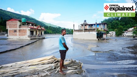 A man stands amid debris after flash floods, at Belkotgadhi in Nuwakot, Nepal, Sunday, Aug. 30, 2026. (PTI Photo/Nand Kumar)