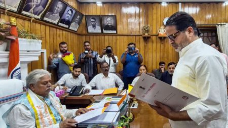 Prashant Kishor takes oath as Bankipur MLA in the presence of Bihar Assembly Speaker Prem Kumar in Patna on Monday. (PTI Photo)