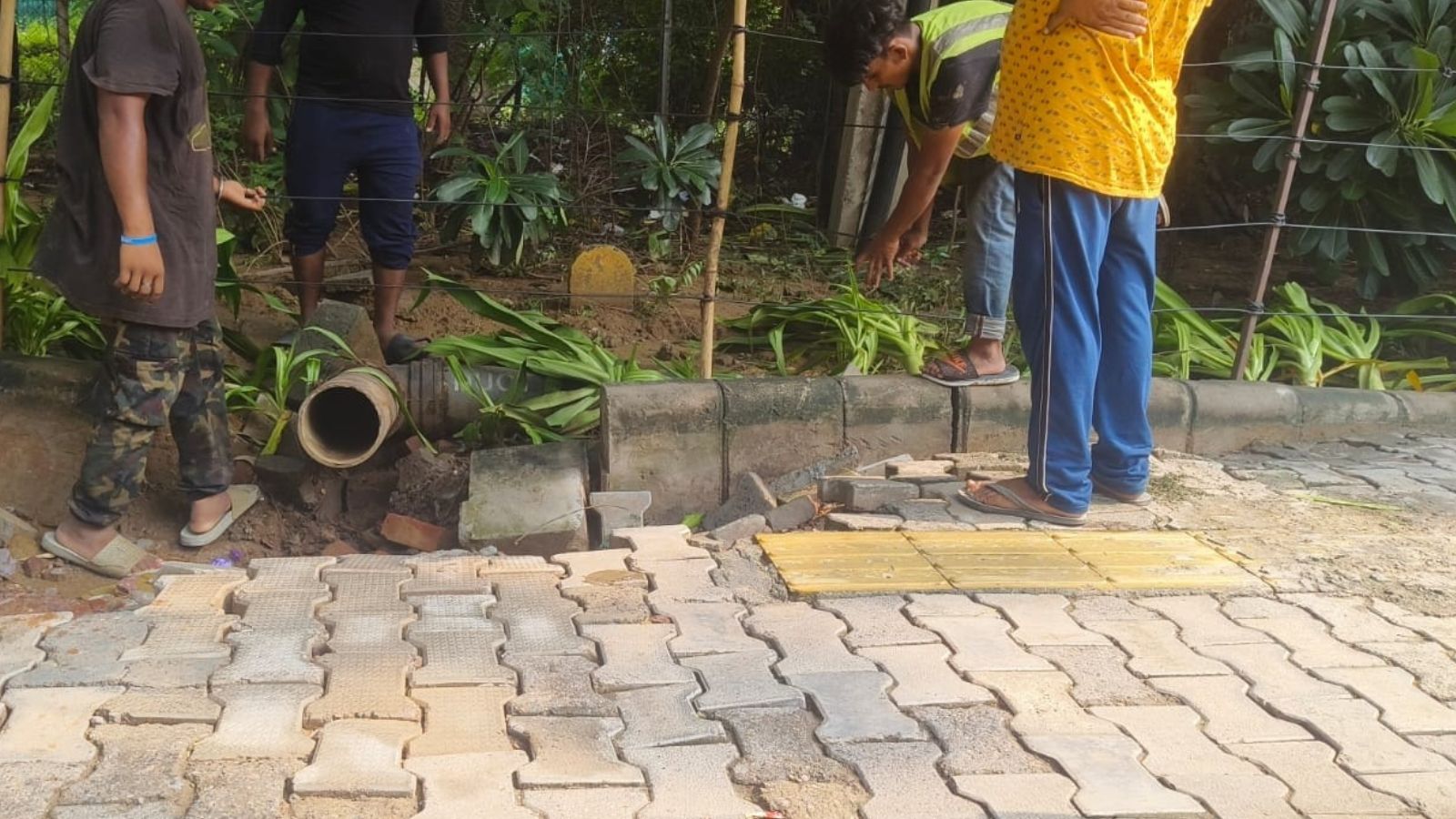Upscale Gurgaon colony pumps out rainwater to save homes, gets FIR warning
