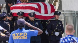 The casket of fallen US Army Sgt. Angel Sarah Rampersad, who was killed in the ongoing war between the US and Iran, is carried by NYPD officers during the funeral procession in the Queens borough of New York on Friday. (AP Photo)