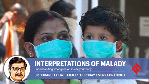 woman and child wearing mask