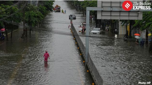 Major canals in Bangkok filled with accumulated rainfall exceeding 20 centimeters (7.8 inches), officials said