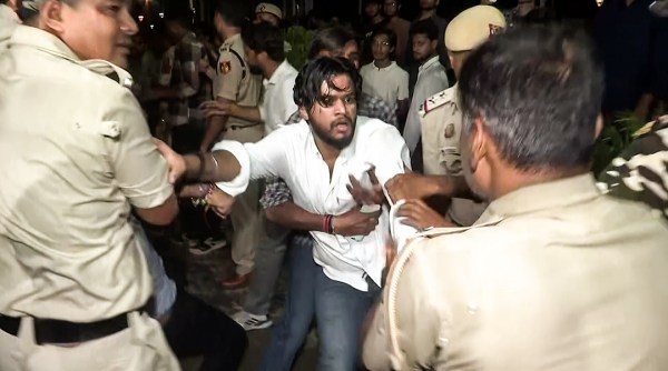 New Delhi, Sep 06 (ANI): Delhi Police detain an Akhil Bharatiya Vidyarthi Parishad member protesting at the MCD Office at Civic Centre over the Satya Niketan building collapse incident, in New Delhi on Sunday. (ANI Video Grab)
