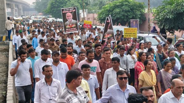 Police acted after residents of Saroli village in Surat's Olpad taluka took out a rally to the police station and handed memorandums to senior IPS officers demanding justice for Amish Patel and an FIR against the suspects. Express photo by Hanif Malek