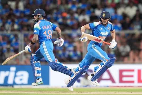 Virat Kohli and Shubman Gill running between the wickets during the 296-run chase against West Indies at the Sports Hub International Cricket Stadium, Thiruvananthapuram.(CREIMAS for BCCI)