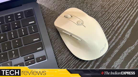 The ASUS Wireless Mouse MD105 features an ergonomic design with a built-in thumb rest for comfortable everyday use. (Image: Bijin Jose/The Indian Express)