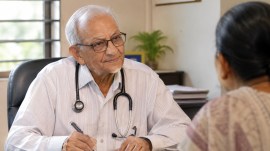 Ahmedabad doctor income-based consultation fee