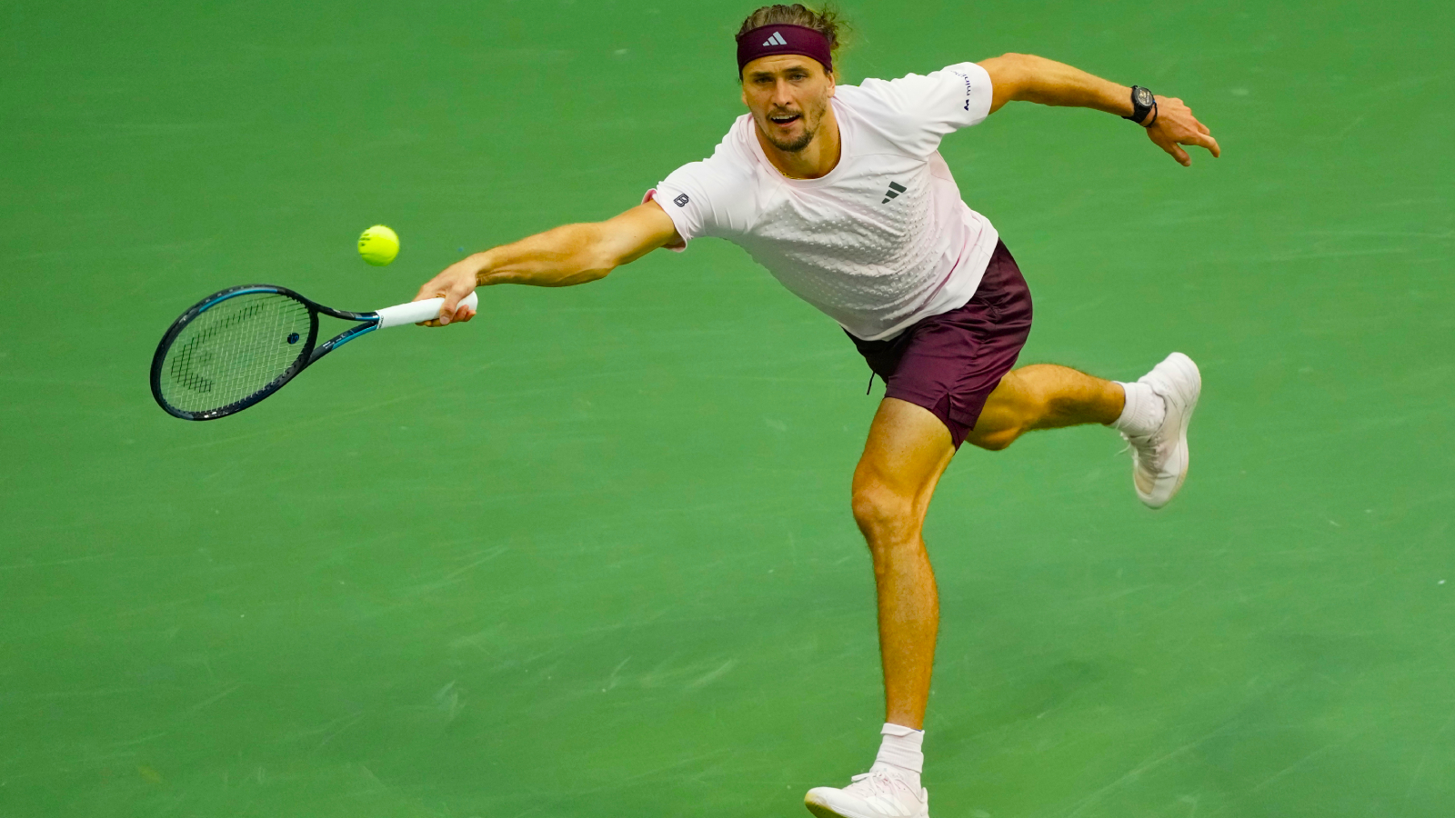 Alexander Zverev returns the ball to Karen Khachanov during the men's singles semifinals of the US Open tennis championships in New York.