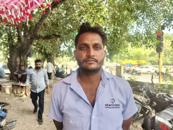 At the GT Karnal depot, Ashu Panchal, 28, said he supplements his daily wage with taking up work on a gig-ride platform