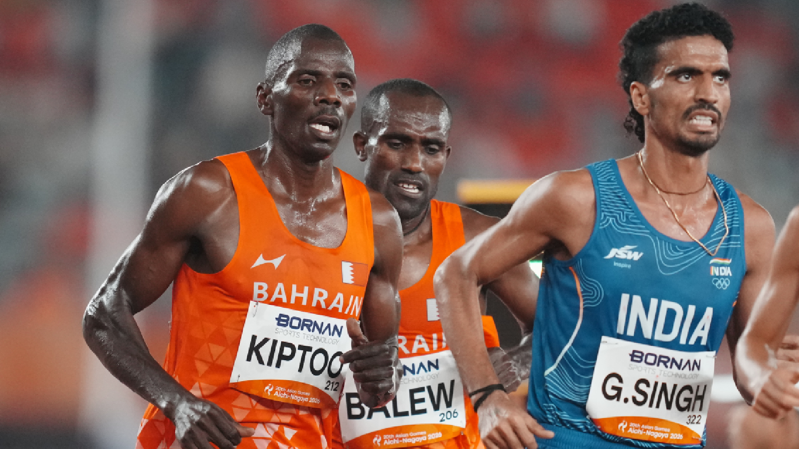 Bahrain's Albert Kiptoo, left, Bahrain's Birhanu Balew, center, and India's Gulveer Singh compete in the men's 10,000-meter final at the Asian Games in Nagoya, Japan, Friday, Sept. 25, 2026.