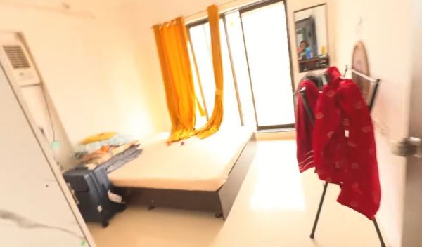 A space used as guest room. (Aanchal Khurana/YouTube)