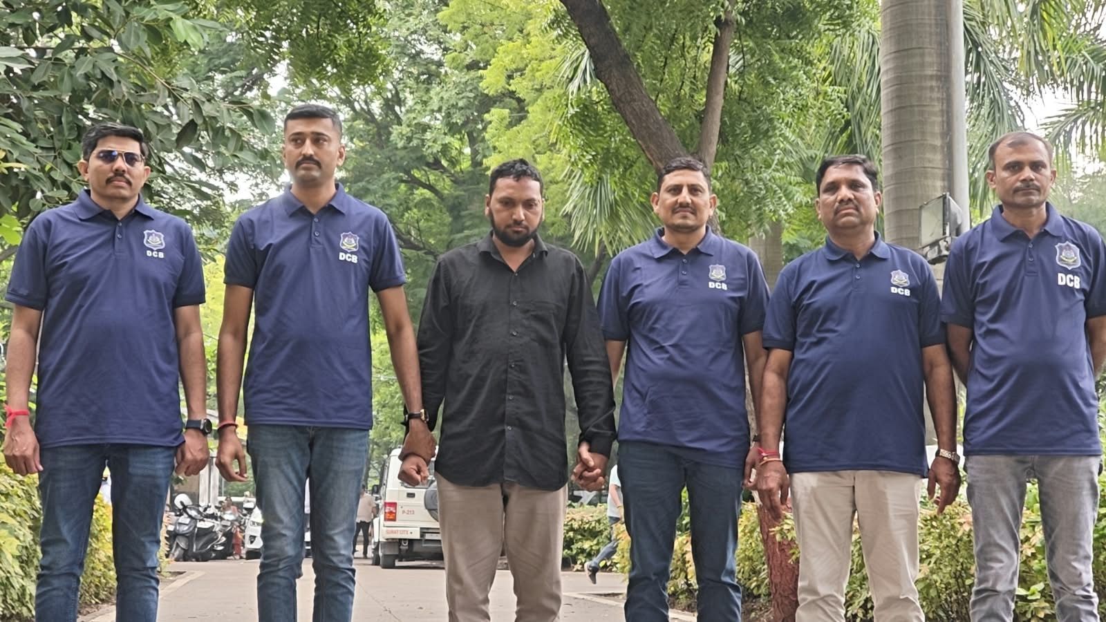 The man in the black shirt is the accused