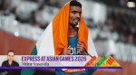 India's Gulveer Singh poses with his country's flag after competing in the men's 10,000-meter final at the Asian Games in Nagoya, Japan, Friday, Sept. 25, 2026. AP/PTI