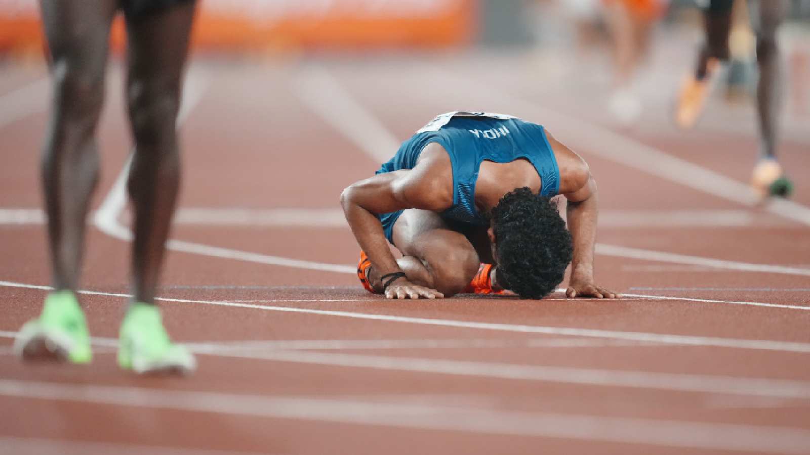 India's Gulveer Singh reacts after competing in the men's 10,000-meter final at the Asian Games in Nagoya, Japan, Friday, Sept. 25, 2026. (AP Photo/Lee Jin-man)