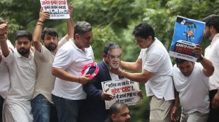 Members of the Indian Youth Congress protest against the CEC Gyanesh Kumar in New Delhi on Monday. (Express Photo by Tashi Tobgyal)