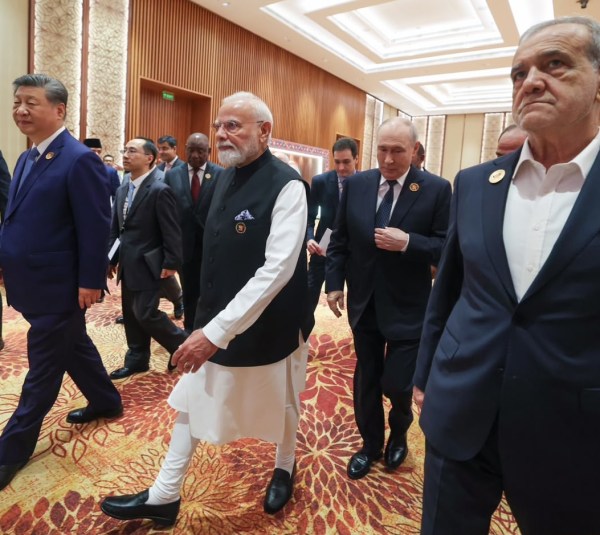 Prime Minister Narendra Modi with Russian President Vladimir Putin, Iranian President Masoud Pezeshkian, and Chinese President Xi Jinping during the 18th BRICS Summit, at the Bharat Mandapam, in New Delhi. (@narendramodi/IG via PTI Photo)