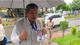 Former Uttarakhand Chief Minister Harish Rawat arrives at the Enforcement Directorate (ED) office after being summoned through a notice by the agency in connection with a 2016 matter, in Dehradun on Saturday. (ANI Video Grab)