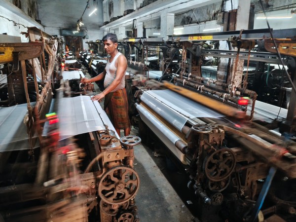 Govindnagar industrial estate lane where seiries of multistorey building where powerloom machines runs in Udhna, Surat. (Express Photos by Hanif Malek)