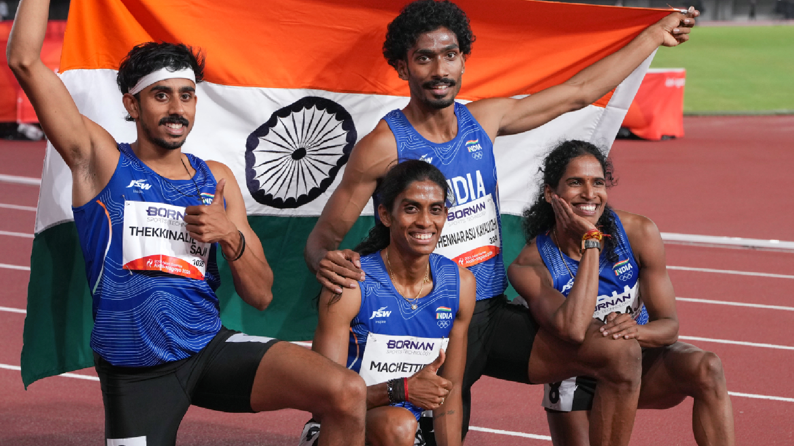 India's T S Manu, M R Poovamma, Vithya Ramraj, and T K Vishal celebrate after winning the silver medal in the 4x400m mixed relay event during the Asian Games, in Nagoya, Japan, Thursday, Sept. 24, 2026. (PTI Photo)