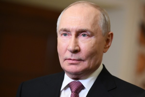 Russian President Vladimir Putin speaks with journalists on the sidelines of the BRICS Summit in New Delhi (Kremlin Pool Photo via AP)
