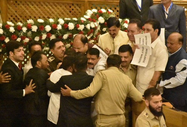 Bharatiya Janata Party (BJP) MLAs protest to interrupt Question Hour on the first day of the Jammu and Kashmir Legislative Assembly's Autumn Session, in Srinagar on Monday.(Express Photo By Shuaib Masoodi) 