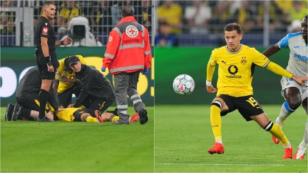 Dortmund's Konstantinos Karetsas lies on the pitch injured during the Champions League opening phase soccer match between Borussia Dortmund and Villarreal in Dortmund, Germany, Tuesday, Sept. 8, 2026. (AP Photo/Martin Meissner)