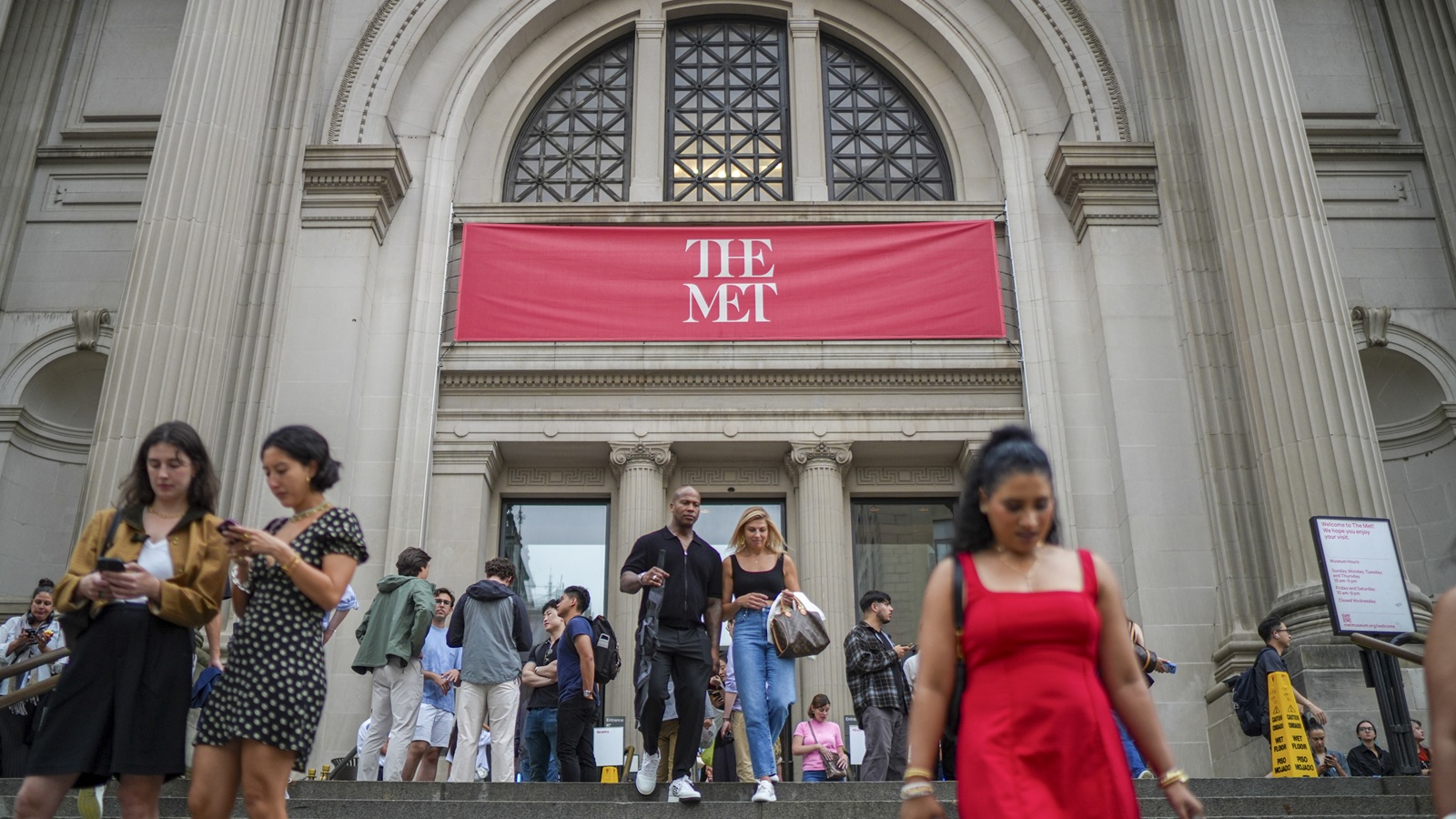 Visitors outside of the Metropolitan Museum of Art in New York