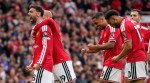 Manchester United's Bruno Fernandes, left, celebrates after scoring his side's third goal during the English Premier League soccer match between Manchester United and Ipswich Town in Manchester, England, Sunday, Aug. 30, 2026. (AP Photo/Dave Thompson)