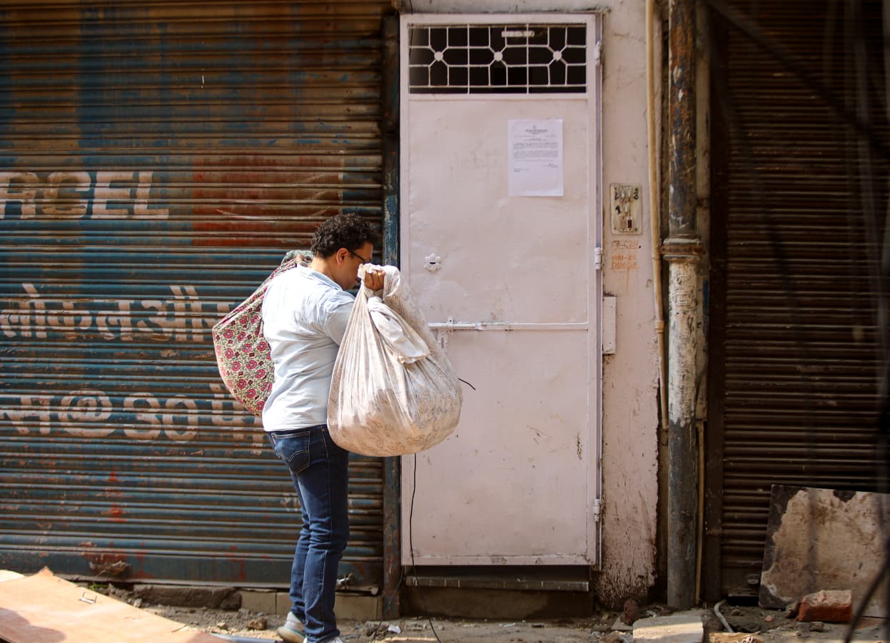 Students move their belongings out of rented accommodation in Delhi’s Satya Niketan, a day after a private hostel building collapsed in the area. 