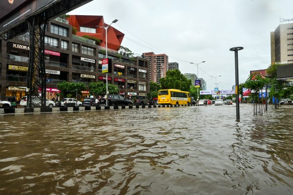 Waterlogging due to heavy rain at Sindhu Bhavan in Ahmedabad on Monday (Express Photo by Bhupendra Rana)