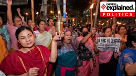 Women hold flaming torches while taking part in a 'meira rally' demanding the implementation of the National Register of Citizens (NRC), in Imphal, Manipur (PTI Photo)