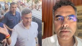 In the video, Pravesh Verma was seen pushing down the man's mobile phone with his hand before appearing to slap him across the face. (Credit: X)