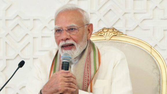 Modi returns to SRCC as PM , Modi returns to SRCC as PM for centenary celebrations, Modi, SRCC, Teachers' Day, centenary, visit, Delhi University, BJP, youth outreach, commemorative stamp, education, Indian express news, current affairs