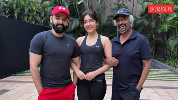 Ram Pothineni, Raashii Khanna and Rajinikanth posing for the photo 