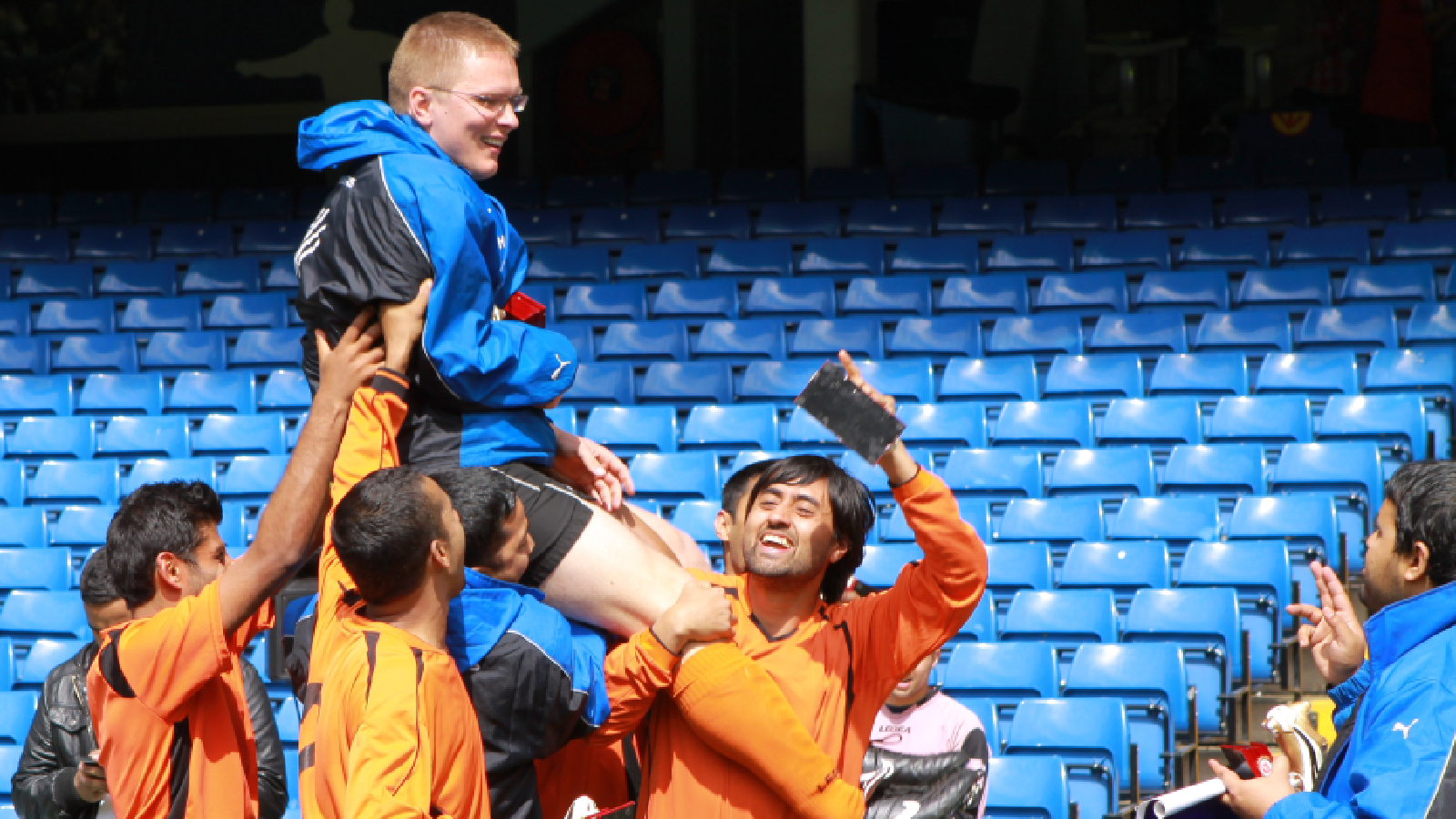 Dambrauskas being lifted by his players after winning the UK Asian Community Cup. (Special Arrangement)