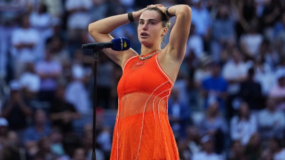Aryna Sabalenka, of Belarus, reacts as she speaks after she lost the women's singles final of the U.S. Open tennis championships against Elena Rybakina, of Kazakhstan, Saturday, Sept. 12, 2026, in New York. (AP Photo/Kirsty Wigglesworth)