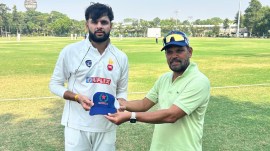Sanat Sangwan with coach Devendra Sharma