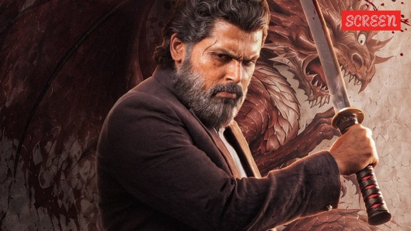 Karthi in a dual role as Agent Sardar Chandra Bose and Agent Vijay Prakash in Sardar 2,
