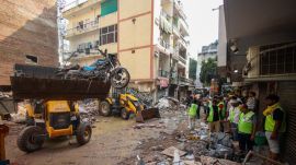 Rescue by the SDRF, ITBP and other agencies after a multiple storey building collapsed at Satya Niketan, New Delhi, on Sunday. (Express Photo by Afshana Ali)
