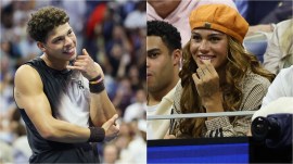 Ben Shelton, of the United States, reacts towards his girlfriend American soccer player Trinity Rodman after defeating Carlos Alcaraz, of Spain, in the quarterfinal round of the U.S. Open tennis championships, Wednesday, Sept. 9, 2026, in New York. (AP Photo/Heather Khalifa)