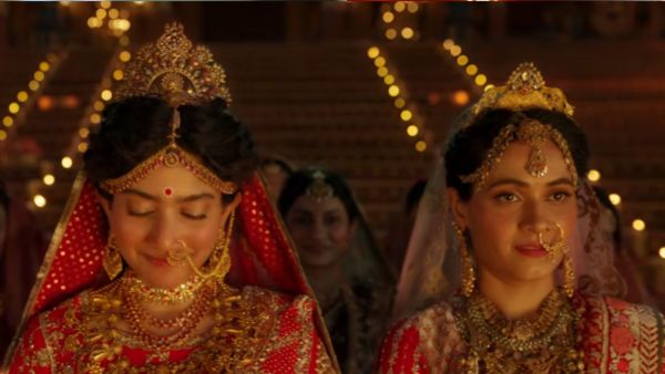 Sonia Balani as Urmila (right)
