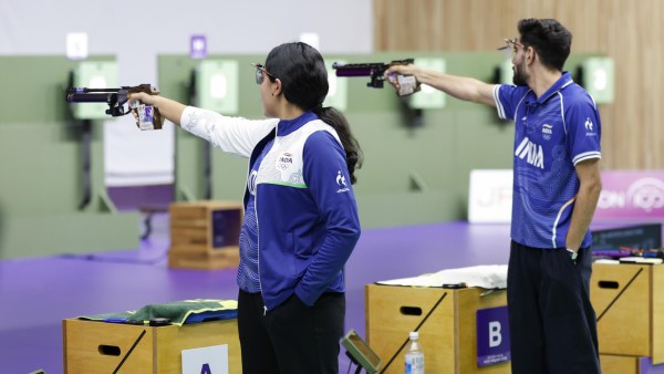Indian 10m air pistol mixed team of Suruchi and Kamaljeet in action.