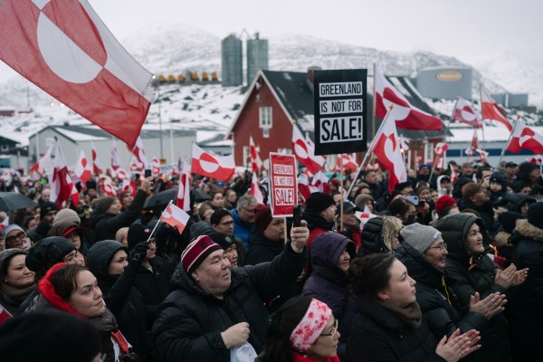 FILE — Crowds gather and wave the flag of Greenland to protest President Donald Trump and his proposal to take over Greenland, in Nuuk, Jan. 17, 2026. (Juliette Pavy/The New York Times)