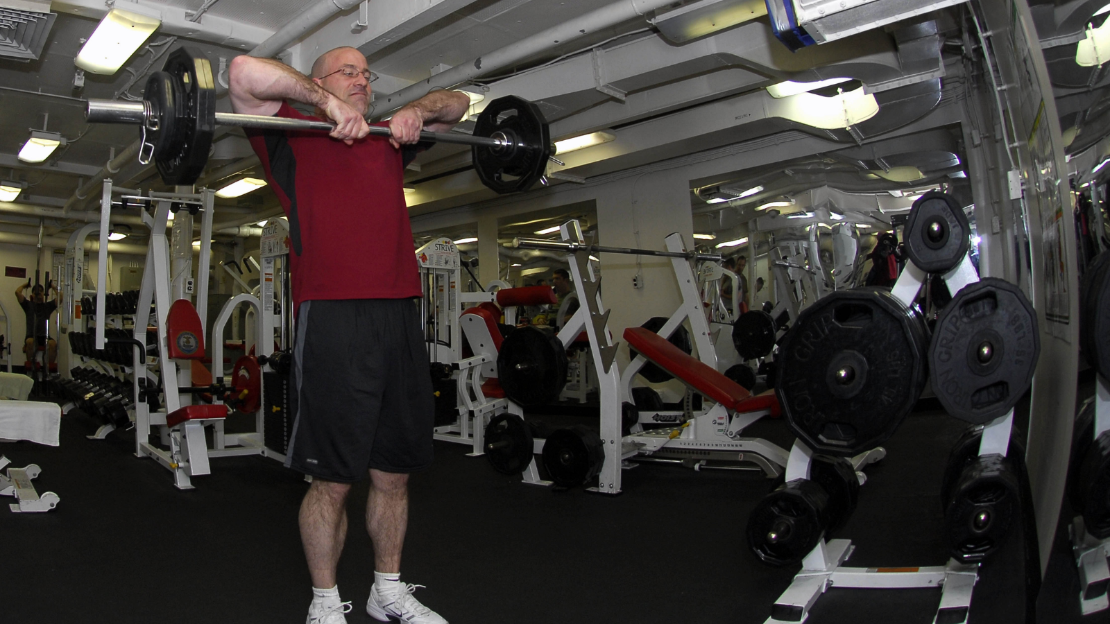An old man focussing on strength training