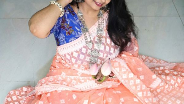 A delicate Dhakai Jamdani sari needs careful cleaning and storage to protect its fine weave and intricate motifs.