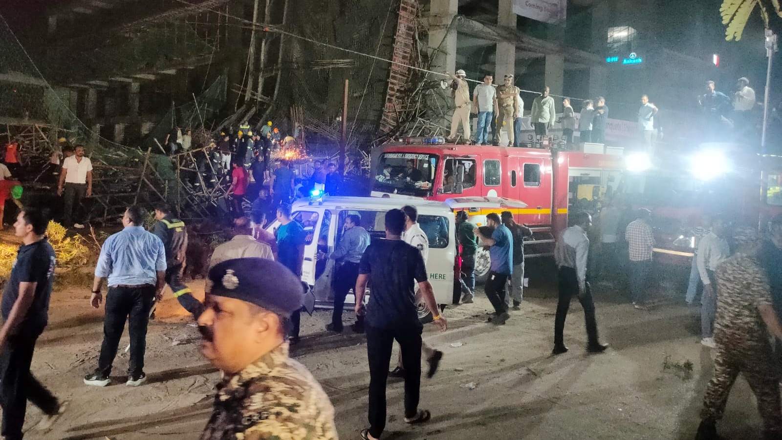 Ceiling slab of under-construction building collapses after crane-hit in Gandhinagar; at least a dozen feared trapped Ceiling slab of under-construction building collapses after crane-hit in Gandhinagar; at least a dozen feared trapped